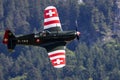 View of Morane-Saulnier M.S.406 fighter aircraft flying over the trees in Aerodrome Epagny Royalty Free Stock Photo