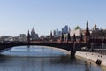 View of the Moscow Kremlin with its towers and cathedrals and reflections in the Moscow River early sunny golden morning Royalty Free Stock Photo