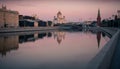 View of the Moscow towers and cathedrals and reflections on the Moscow River in an early sunny golden morning Royalty Free Stock Photo