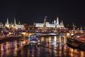 View of Moscow at night with a panorama of the Moscow Kremlin and a large stone bridge over the Moscow river. Moscow Royalty Free Stock Photo