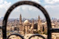 View on the Mosque-madrasa of Sultan Hassan through the old gate of the Citadel in Cairo