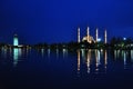 The view mosque and reflection at night, city background