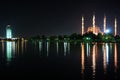 The view mosque and reflection at night, city background