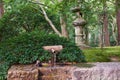 A ritual bamboo washbasin tsukubai at the entrance to the Ryoan-ji temple. Kyoto. Japan