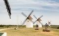 View of Mota del Cuervo with windmills and iron statues of Don Quixote and Sancho Panza Royalty Free Stock Photo