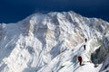 View of Mount Annapurna with group of climbers