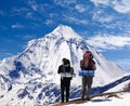 View of mount Dhaulagiri with two tourists