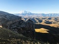 view of Mount Elbrus and rocks of Bermamyt Plateau
