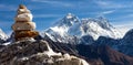 View of Mount Everest and Lhotse with stone man or pyramid from Renjo pass