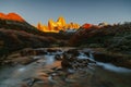 View of Mount Fitz Roy and the river in the National Park of Los Glaciares during sunrise. Autumn in Patagonia, the