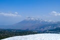 View of Mount Hachimantai, with green pine forest.