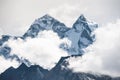 View of Mount Kangtega with clouds in Himalaya mountains, Nepal. Royalty Free Stock Photo