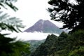 View of Mount Merapi in the morning, and slightly covered by clouds. Potentially eruptive volcano