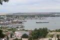 Kerch, Crimea - Jane 24, 2018: View from Mount Mithridates to the sea trading port. Dry cargo ship enters port water area