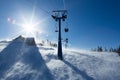 View from mount peak on Sheregesh ski resort and Altai mountains or Gornaya Shoria. Active winter rest, skiers and snowboarders on