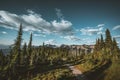 View from Mount Revelstoke across forest with blue sky and clouds. British Columbia Canada. Royalty Free Stock Photo