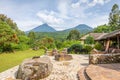 View of mount Sabyinyo and mount Gahinga, two of the volcanoes in the Volcanoes National Park in Rwanda. Picture shot standing in