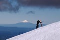 View on Mount Taranaki from Turoa Skifield, snowboarder in background, winter season, New Zealand Royalty Free Stock Photo