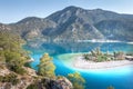 View from mountain on beautiful beach with umbrellas in Oludeniz, Turkey