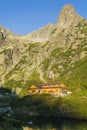 View of the mountain chalet Chata pri Zelenom plese in the background the visible peak of Jastrabia veza