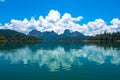 View of mountain and cloud reflections in lake. Royalty Free Stock Photo