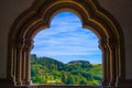 View of the mountain and forest in Vianden, Luxembourg, from an arch inside the Vianden Castle Royalty Free Stock Photo