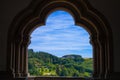 View of the mountain and forest in Vianden, Luxembourg, from an arch inside the Vianden Castle Royalty Free Stock Photo