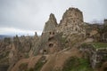 View of the mountain-fortress of Uchisar and the cave city. Cappadocia Royalty Free Stock Photo