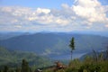 A view of a mountain lake from the top of a high hill Royalty Free Stock Photo