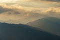 View of a mountain range in the Alps of Europe during sunset. Slopes in Autumn Royalty Free Stock Photo