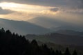 View of a mountain range in the Alps of Europe during sunset. Slopes in Autumn Royalty Free Stock Photo