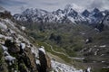 View of a mountain range blanketed in snow, showcasing the majestic beauty of the snow-covered peaks and valleys