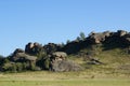 View of a mountain range with ledges and rocks of unusual shape