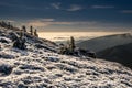 View from mountain range to the valley above fog and clouds Royalty Free Stock Photo