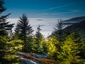 View from mountain range to the valley above fog and clouds Royalty Free Stock Photo