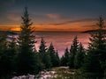 View from mountain range to the valley above fog and clouds at sunset Royalty Free Stock Photo