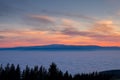 View from mountain Schoeckl over low stratus to beautiful sunset