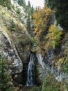 View of a mountain waterfall in summer