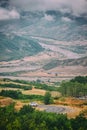 View of mountains Babadag in the clouds and a river Girdimanchay Lahij yolu from the side in Lahic village, Azerbaijan