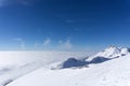 View on mountains and blue sky above clouds Royalty Free Stock Photo