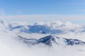 View on mountains and blue sky above clouds Royalty Free Stock Photo