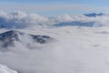 View on mountains and blue sky above clouds Royalty Free Stock Photo