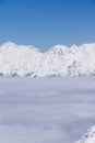 View on mountains and blue sky above clouds Royalty Free Stock Photo