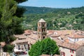 View on mountains cliff, old houses, green valley in remote medieval village Moustiers-Sainte-Marie in Provence, France Royalty Free Stock Photo