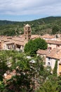 View on mountains cliff, old houses, green valley in remote medieval village Moustiers-Sainte-Marie in Provence, France Royalty Free Stock Photo