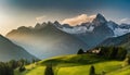 view on mountains, in foreground defocused meadow, warm sun light Royalty Free Stock Photo