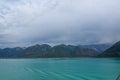 A view of mountains and icebergs in the Wrangell National Park outside of Hubbard Glacier Alaska from a cruise ship Royalty Free Stock Photo