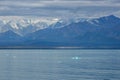 A view of mountains and icebergs in the Wrangell National Park outside of Hubbard Glacier Alaska from a cruise ship Royalty Free Stock Photo