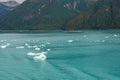 A view of mountains and icebergs in the Wrangell National Park outside of Hubbard Glacier Alaska from a cruise ship Royalty Free Stock Photo