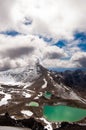 view of mountains, lakes and blue sky with white clouds in tongarino national park new zealand Royalty Free Stock Photo